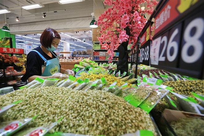 Trung Quốc: Lạm phát giảm hơn dự báo, mở đường cho hạ lãi suất ảnh 1