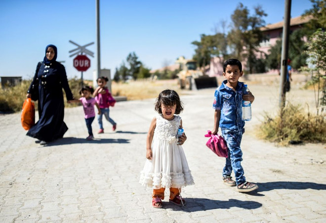 Người tị nạn Syria quay trở lại quê hương ngày 7/9. (Nguồn: Sputniknews) Toàn cảnh những sự kiện nổi bật diễn ra trong tuần qua ảnh 22