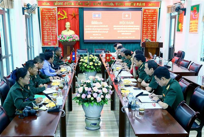 Thúc đẩy hợp tác tìm kiếm hài cốt bộ đội, dân công hy sinh ở Lào ảnh 2