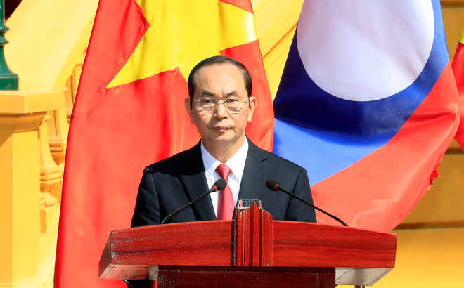 Chủ tịch nước Trần Đại Quang phát biểu tại buổi họp báo. (Ảnh: Nhan Sáng/TTXVN) Phát biểu của Chủ tịch nước bế mạc Năm Đoàn kết Hữu nghị Việt-Lào ảnh 1