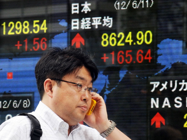 Chỉ số chứng khoán châu Á đua nhau chạm các mức cao kỷ lục ảnh 1