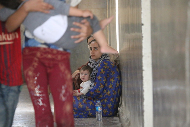 Hai mẹ con ở Syria, đất nước có mối quan tâm sâu sắc về tác động tiềm tàng của COVID-19 trong bối cảnh xung đột ở đây vẫn đang diễn ra. (Nguồn: WFP) An ninh lương thực thế giới trong "tâm bão" COVID-19 ảnh 1