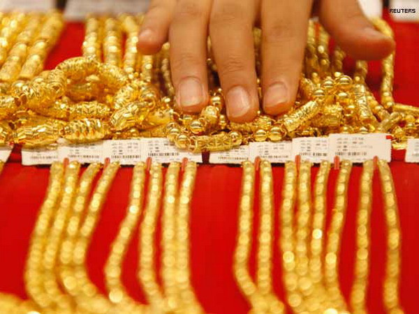 Giá vàng giảm sau ba phiên tăng nhẹ do tin về QE3 ảnh 1