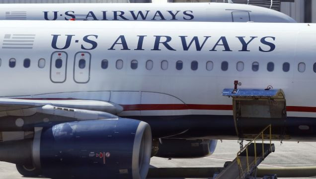 Máy bay của US Airways hạ cánh khẩn cấp vì phát hiện mùi lạ ảnh 1