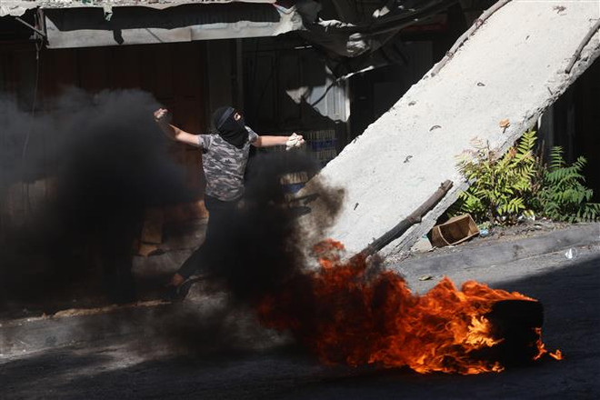 Ai Cập hối thúc các bên kiềm chế sau vụ tấn công ở Jerusalem ảnh 1