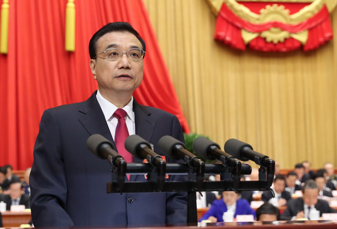 Trung Quốc hạ mục tiêu tăng trưởng kinh tế thấp nhất trong 25 năm ảnh 1