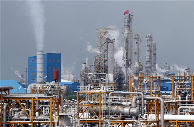 Giếng dầu South Pars tại cảng Assaluyeh của Iran. (Ảnh: AFP/TTXVN) Giá dầu châu Á tiếp tục giảm trong phiên giao dịch 21/7 ảnh 1