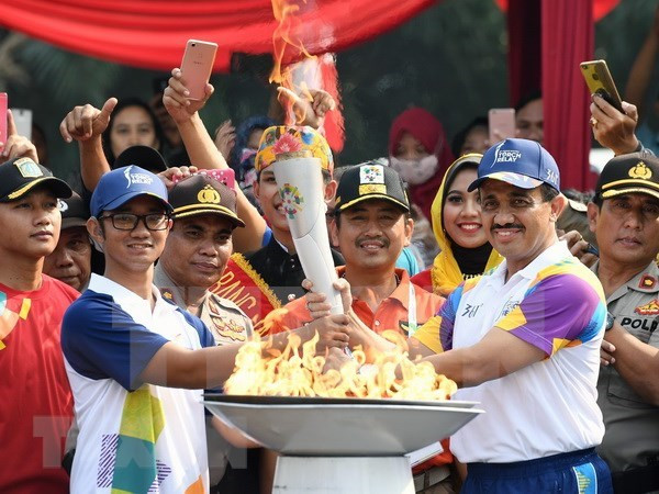 Ngọn đuốc Đại hội thể thao châu Á (ASIAD) tại Jakarta (Indonesia), ngày 15/8/2018. (Nguồn: THX/TTXVN) ASEAN Para Games 2022: Indonesia gấp rút chuẩn bị cho lễ rước đuốc ảnh 1