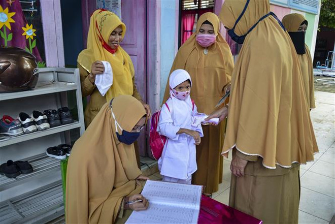 Campuchia thí điểm thuốc Molnupiravir, Indonesia chưa tiêm cho trẻ ảnh 2