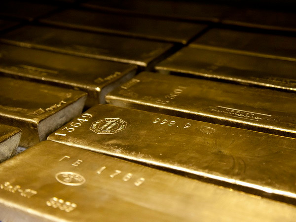 Giá vàng thế giới đảo chiều giảm nhẹ trong phiên đầu tuần ảnh 1
