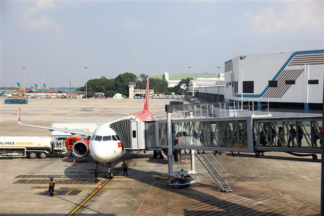 Dự kiến, nhu cầu đi lại bằng đường hàng không tiếp tục cải thiện và gia tăng trong dịp Tết nguyên đán. (Ảnh: Huy Hùng/TTXVN) Phục vụ tốt nhất nhu cầu đi lại đường hàng không dịp Tết Nguyên đán ảnh 1