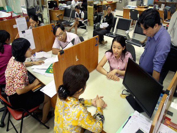 Ảnh minh họa. (Nguồn: TTXVN) Tăng cường kiểm tra cán bộ thường xuyên tiếp xúc với người nộp thuế ảnh 1