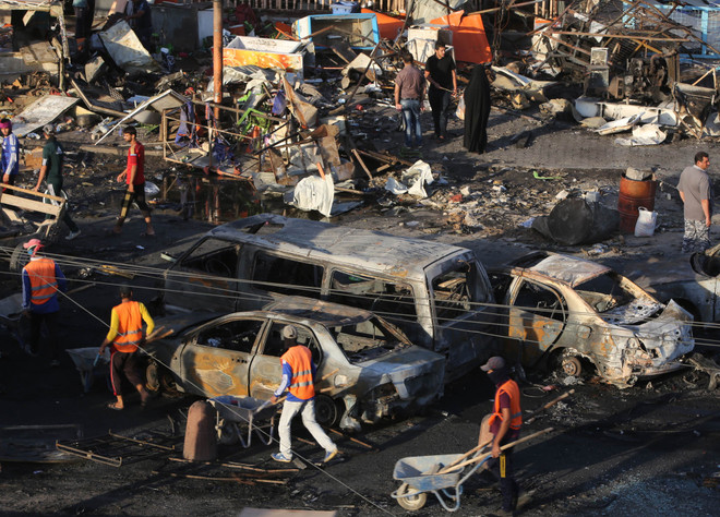 Đánh bom xe liều chết ở thủ đô của Iraq làm 14 người chết ảnh 1