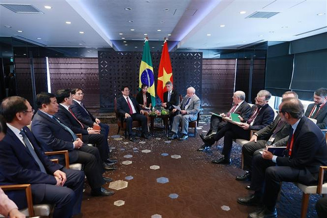 Thủ tướng Phạm Minh Chính hội kiến Tổng thống Brazil Luiz Inácio Lula da Silva. (Ảnh: Dương Giang/TTXVN) Thủ tướng Phạm Minh Chính gặp lãnh đạo một số nước trong chiều 21/5 ảnh 1