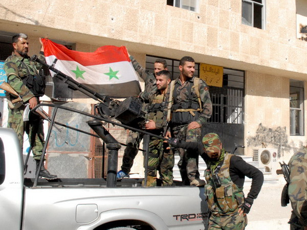 Binh sỹ Syria. (Nguồn: AFP/TTXVN) SOHR: Quân đội Syria giành thắng lợi chiến lược tại Aleppo ảnh 1