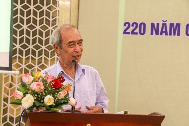Nhà nghiên cứu Nguyễn Xuân Hoa trình bày tham luận tại hội thảo. (Ảnh: Mai Trang/TTXVN) quoc hieu viet nam_hoi thao 2.jpeg