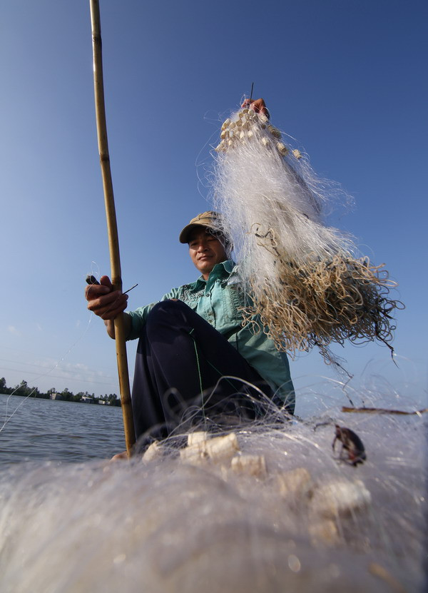 [Photo] Mưu sinh mùa nước nổi ở Đồng bằng sông Cửu Long ảnh 3
