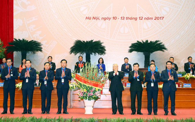 Tổng Bí thư Nguyễn Phú Trọng tặng lẵng hoa chúc mừng Đại hội. (Nguồn: TTXVN) Toàn văn bài phát biểu của Tổng Bí thư tại Đại hội Đoàn toàn quốc ảnh 2