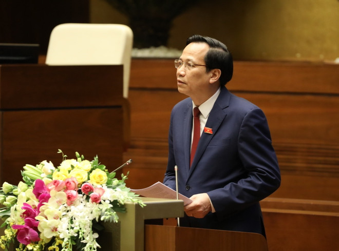 Bộ trưởng Bộ Lao động-Thương binh và Xã hội Đào Ngọc Dung giải trình ý kiến của đại biểu Quốc hội. (Ảnh: Văn Điệp/TTXVN) Đề nghị Quốc hội phê chuẩn gia nhập Công ước xóa bỏ lao động cưỡng bức ảnh 2