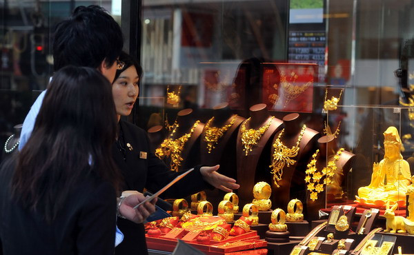 Vàng chấm dứt ba phiên tăng giá trong bối cảnh đồng USD mạnh lên ảnh 1