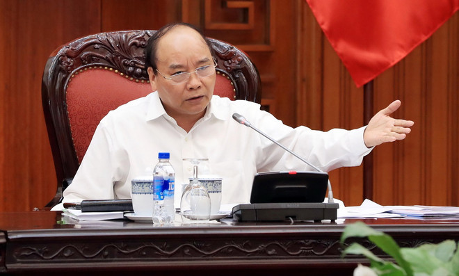 Thủ tướng Nguyễn Xuân Phúc chủ trì Phiên họp Thường trực Chính phủ về Dự án đường sắt đô thị Thành phố Hồ Chí Minh. (Ảnh: Thống Nhất/TTXVN) Thường trực Chính phủ họp về dự án đường sắt đô thị TP.HCM ảnh 1
