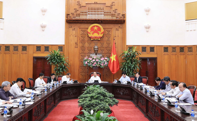 Thủ tướng Nguyễn Xuân Phúc chủ trì Phiên họp Thường trực Chính phủ về Dự án đường sắt đô thị Thành phố Hồ Chí Minh. (Ảnh: Thống Nhất/TTXVN) Thường trực Chính phủ họp về dự án đường sắt đô thị TP.HCM ảnh 2