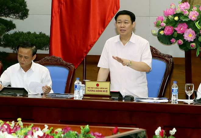 Phó Thủ tướng Chính phủ Vương Đình Huệ chủ trì hội thảo. (Ảnh: Nguyễn Dân/TTXVN) Doanh nghiệp cần chính sách thông thoáng hơn là hỗ trợ bằng tiền ảnh 1
