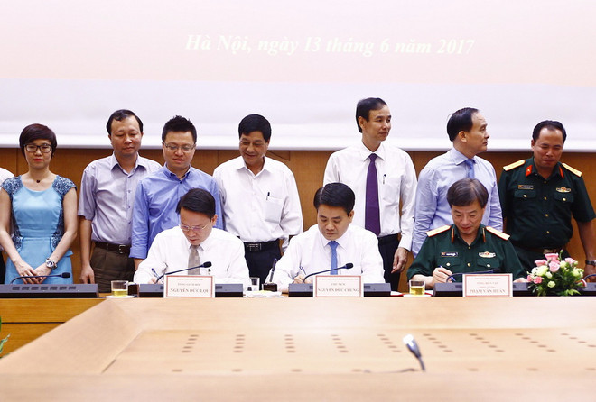 Hà Nội và Thông tấn xã Việt Nam ký kết chương trình phối hợp công tác ảnh 2