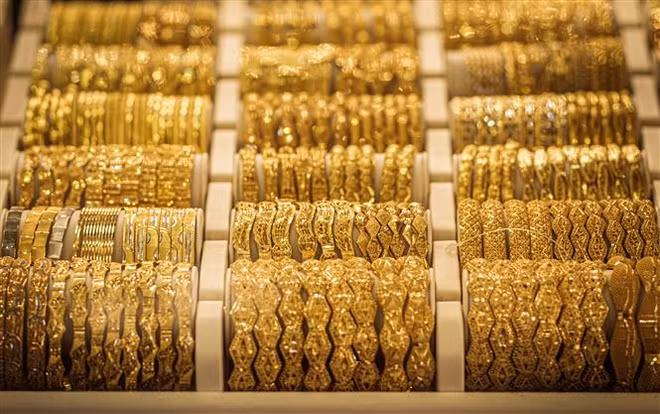 Giá vàng thế giới đi lên trong phiên 28/3 khi đồng USD yếu hơn ảnh 1