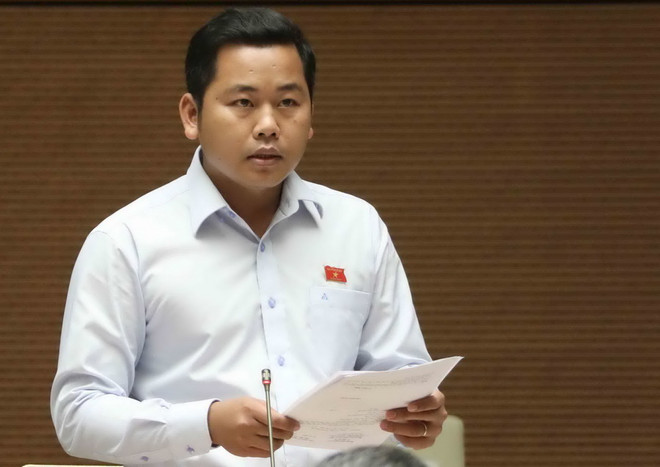 Đại biểu Quốc hội Dương Tuấn Quân phát biểu ý kiến. (Ảnh: Phương Hoa/TTXVN) Không để xả lũ gây thiệt hại cho dân mà vẫn là "đúng quy trình" ảnh 1