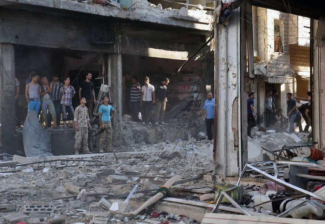 [Photo] 14 người bị thương trong vụ đánh bom xe tại Syria ảnh 1