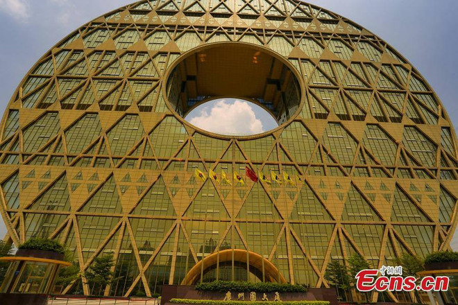 [Photo] Trung Quốc "chơi trội" với tòa nhà đồng xu lớn nhất thế giới ảnh 3