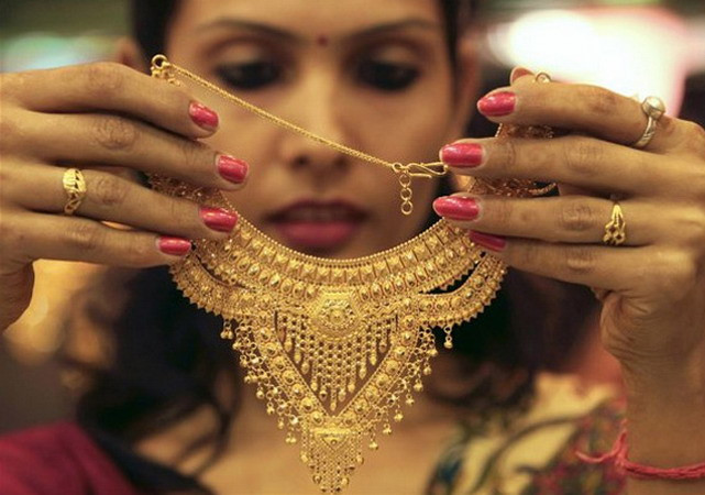 Giá vàng hướng đến tuần tăng giá mạnh nhất trong bốn tháng ảnh 1