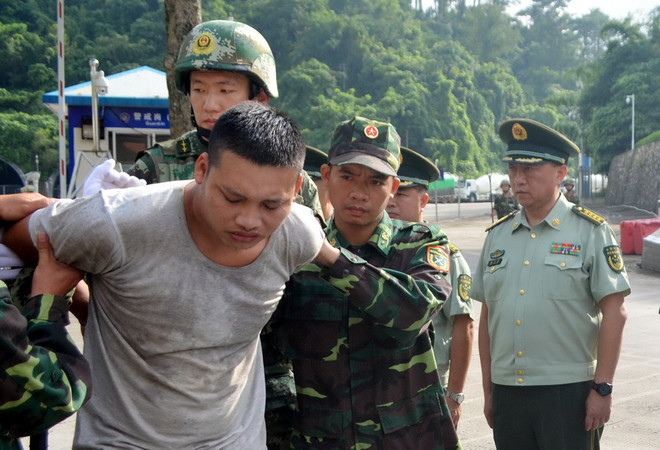 Trung Quốc bàn giao cho Việt Nam 2 đối tượng có lệnh truy nã đặc biệt ảnh 1