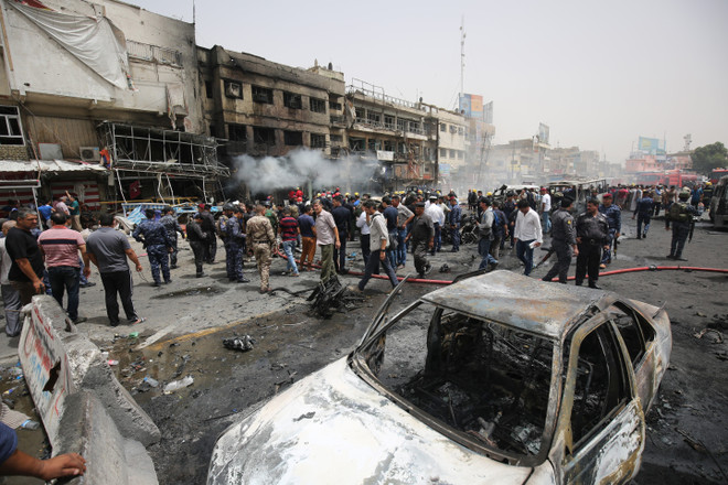 Hiện trường một vụ đánh bom khủng bố tại Iraq. (Nguồn: AFP/TTXVN) Trung Quốc đề nghị quốc tế tích cực chia sẻ thông tin tình báo ảnh 1