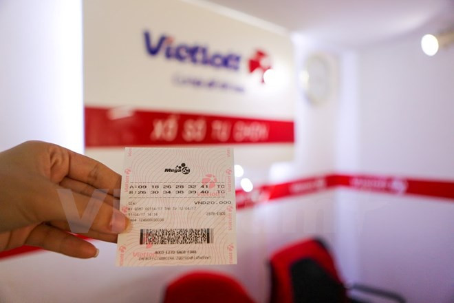 Ảnh minh họa. (Nguồn: Minh Sơn/Vietnam+) Mua 1 vé số duy nhất, khách hàng ở Bà Rịa-Vũng Tàu trúng 132 tỷ đồng ảnh 1