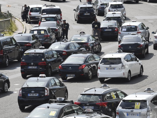 Uber đình chỉ dịch vụ UberPOP tại Pháp do gây nhiều tranh cãi ảnh 1