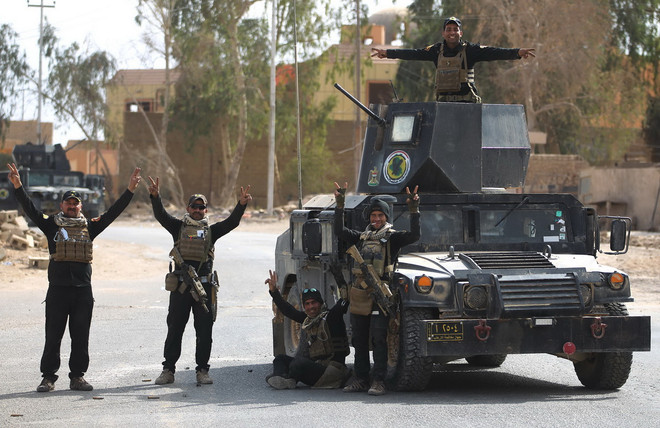 Các lực lượng Iraq giành lại thị trấn cuối cùng từ tay IS ảnh 1