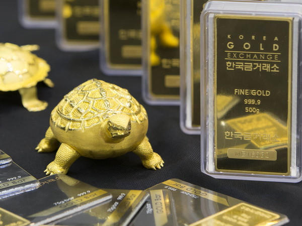 Giá vàng châu Á chạm mức cao nhất trong hơn 7 tuần qua ảnh 1