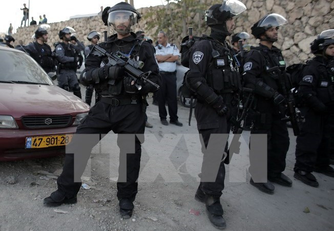 Lực lượng an ninh Israel. (Nguồn: AFP/TTXVN) Israel bắt giữ 8 kẻ cực đoan Do Thái chống người Arab ảnh 1