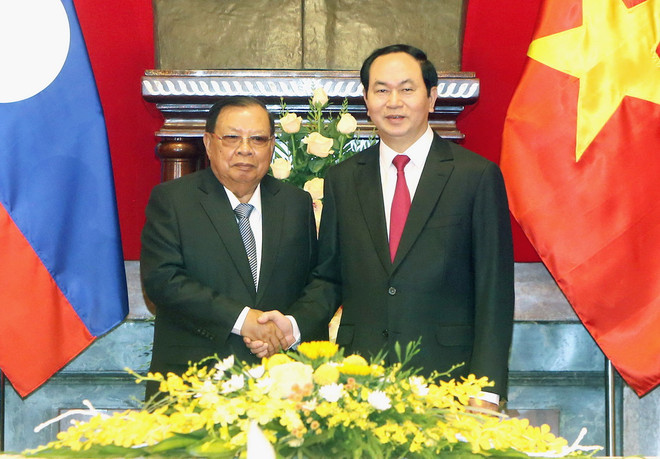 Báo chí Lào đưa đậm chuyến thăm Việt Nam của Tổng Bí thư Lào ảnh 1