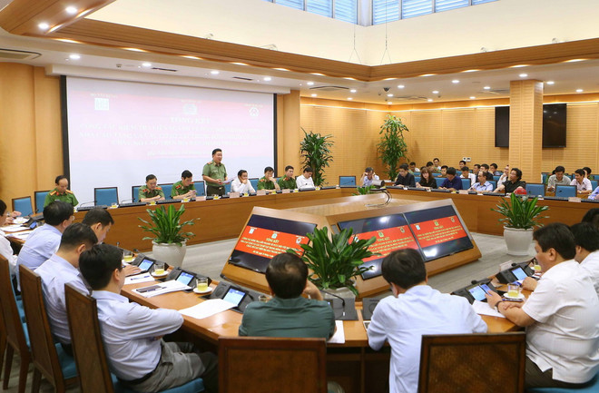 Quang cảnh hội nghị. (Ảnh: Doãn Tấn/TTXVN) Bộ Công an: Hà Nội cần giải quyết dứt điểm tồn tại phòng cháy chung cư ảnh 1