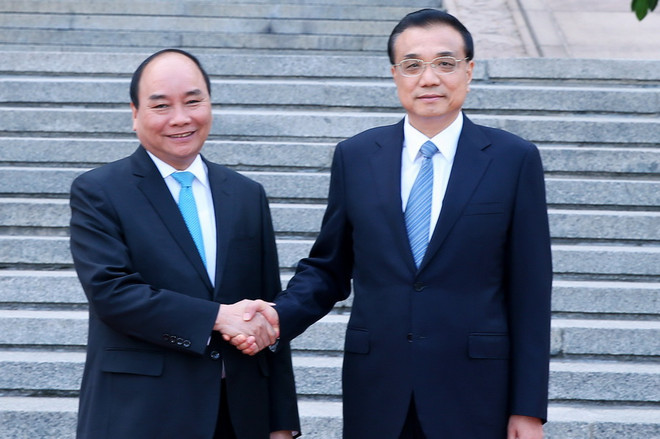 [Photo] Ngày đầu tiên Thủ tướng thăm chính thức Trung Quốc ảnh 4