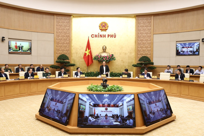 Phó Thủ tướng Thường trực Trương Hòa Bình, Chủ tịch Ủy ban An ninh hàng không dân dụng quốc gia phát biểu khai mạc. (Ảnh: Văn Điệp/TTXVN) Phòng, chống hành vi can thiệp bất hợp pháp mạng thông tin hàng không ảnh 1
