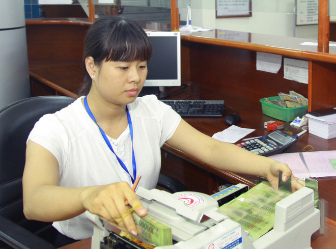 Kiểm ngân tại Kho bạc Nhà nước, Quận 2, Thành phố Hồ Chí Minh. Ảnh minh họa. (Nguồn: TTXVN) Công khai minh bạch thu chi để tránh thất thoát vốn ngân sách ảnh 1