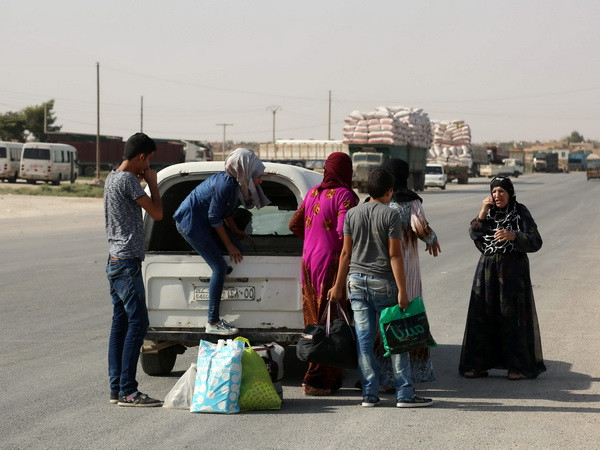 Lực lượng người Kurd và quân Chính phủ Syria nhất trí lệnh ngừng bắn ảnh 1