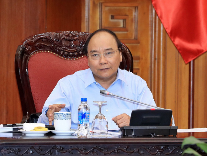 Thủ tướng Nguyễn Xuân Phúc phát biểu tại cuộc họp. (Ảnh: Thống Nhất/TTXVN) Thủ tướng chủ trì họp về hợp tác thương mại Việt Nam-EU ảnh 1