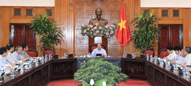 Thủ tướng Nguyễn Xuân Phúc chủ trì cuộc họp bàn về thúc đẩy hợp tác kinh tế thương mại đầu tư Việt Nam-EU. (Ảnh: Thống Nhất/TTXVN) Thủ tướng chủ trì họp về hợp tác thương mại Việt Nam-EU ảnh 2