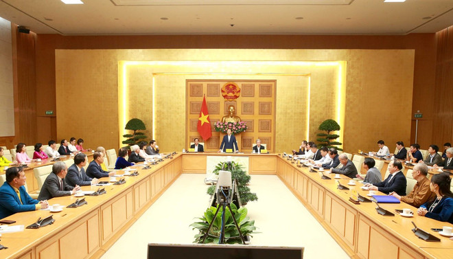 Quang cảnh buổi làm việc. (Ảnh: Phương Hoa/TTXVN) pho thu tuong tran hong ha_cham soc suc khoe cong dong 2.jpg