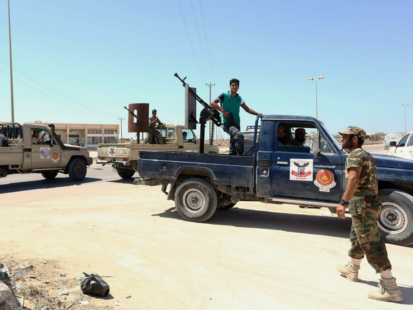 Ảnh minh họa. (Nguồn: AFP/TTXVN) Xung đột vũ trang tái bùng phát ở thủ đô Tripoli của Libya ảnh 1
